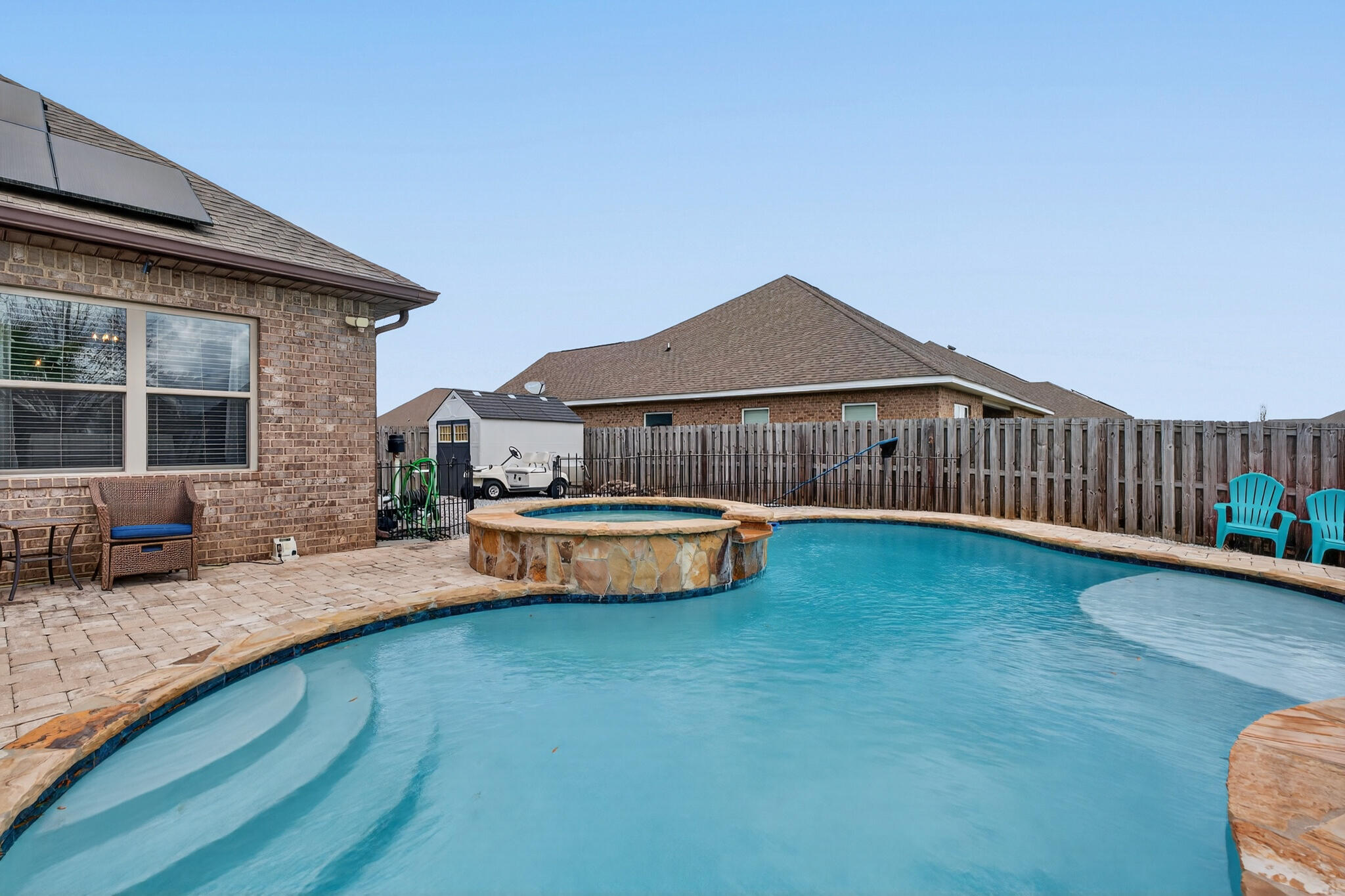 511 Gadwell Street Crestview, FL 32539 - Photo 37 of 48 a view of a house with swimming pool and sitting area