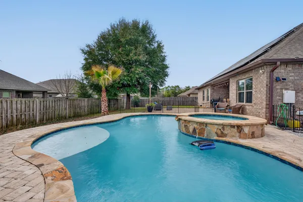 a swimming pool view with a outdoor space