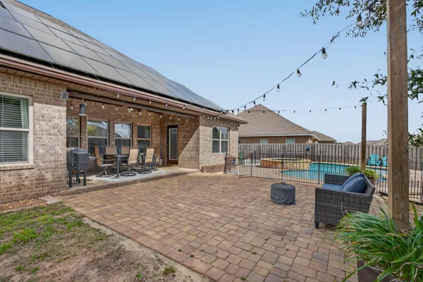 a backyard of a house with seating space