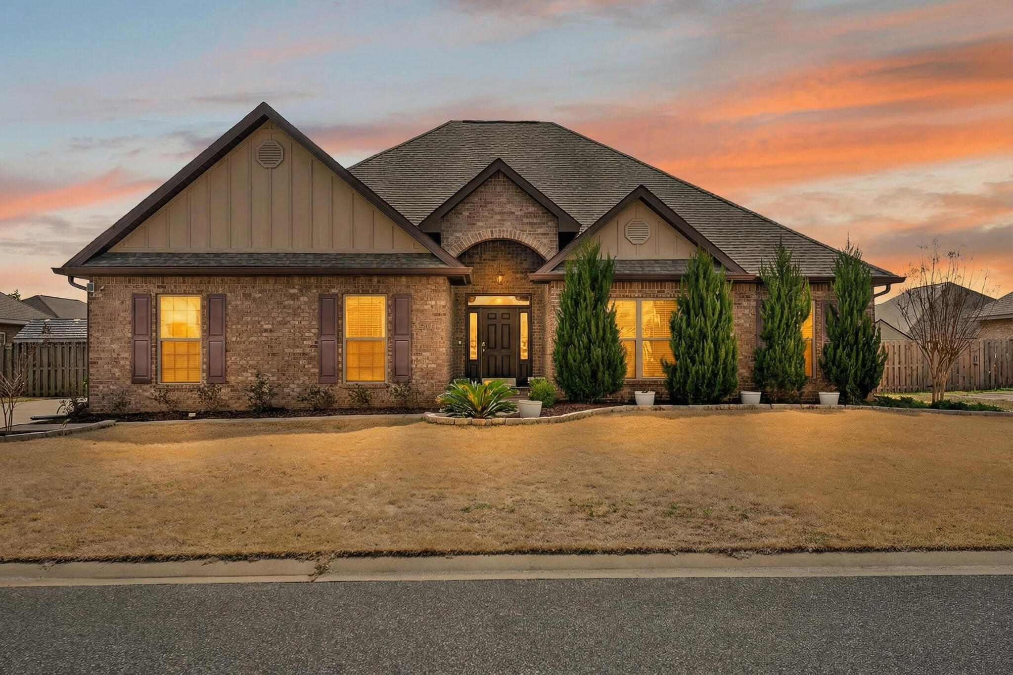 511 Gadwell Street Crestview, FL 32539 - Photo 48 of 48 a front view of house with yard and trees in the background