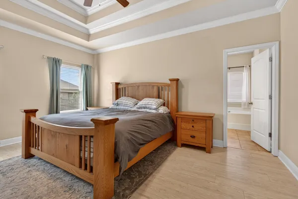a bedroom with a bed and a cabinets