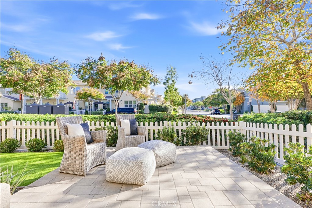 67 Promesa Avenue Rancho Mission Viejo, CA 92694 - Photo 14 of 75 a view of a chair and tables in the backyard