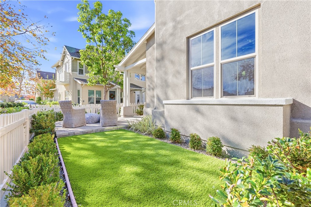 67 Promesa Avenue Rancho Mission Viejo, CA 92694 - Photo 15 of 75 a view of a house with a garden and pathway