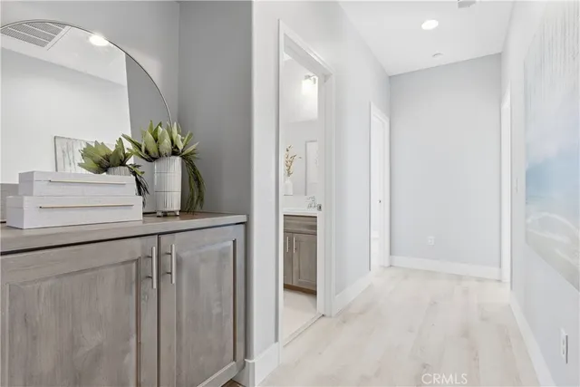 a view of a city with mountains in the background