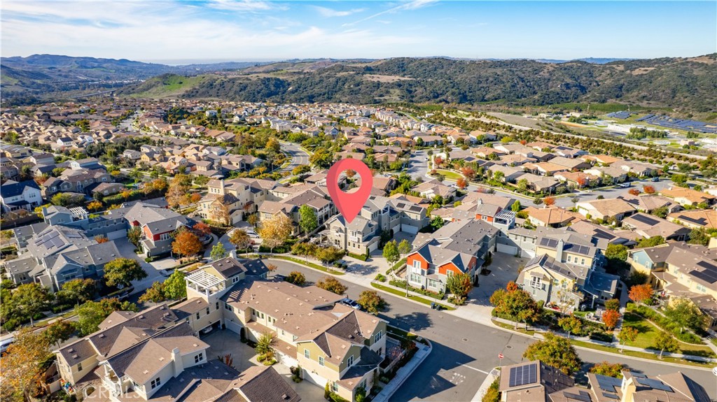 67 Promesa Avenue Rancho Mission Viejo, CA 92694 - Photo 47 of 75 an aerial view of residential building and lake