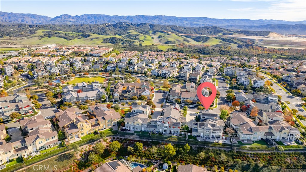 67 Promesa Avenue Rancho Mission Viejo, CA 92694 - Photo 50 of 75 a view of a city with mountains in the background