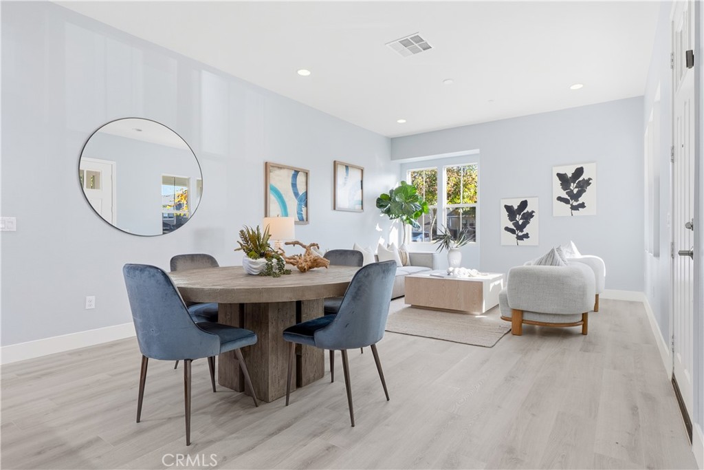 67 Promesa Avenue Rancho Mission Viejo, CA 92694 - Photo 6 of 75 a view of a dining room with furniture window and wooden floor