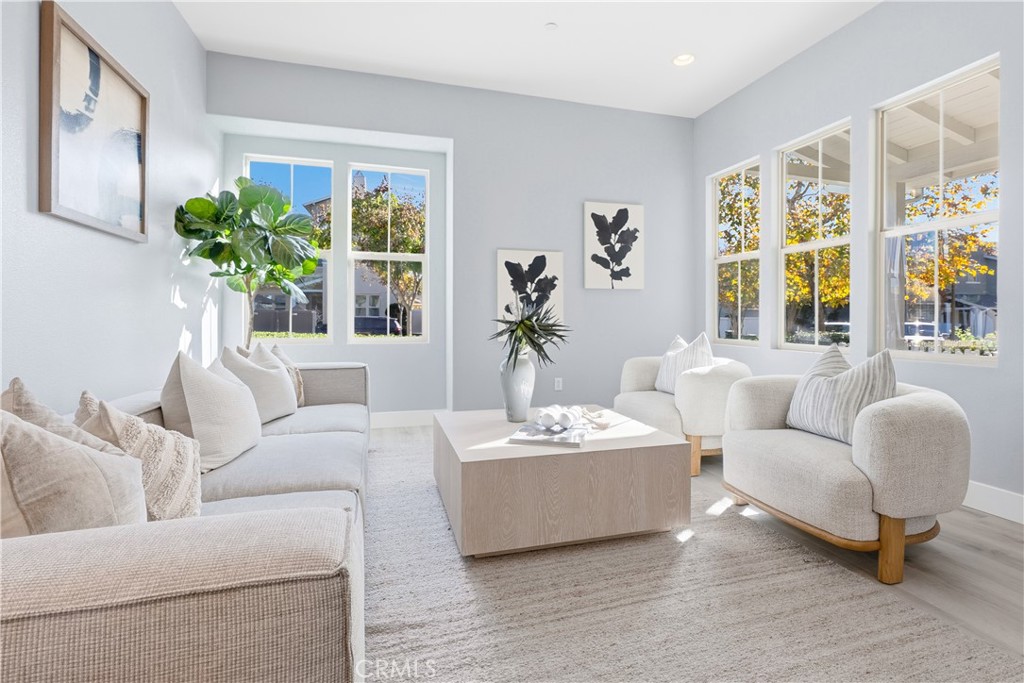 67 Promesa Avenue Rancho Mission Viejo, CA 92694 - Photo 9 of 75 a living room with furniture and a large window