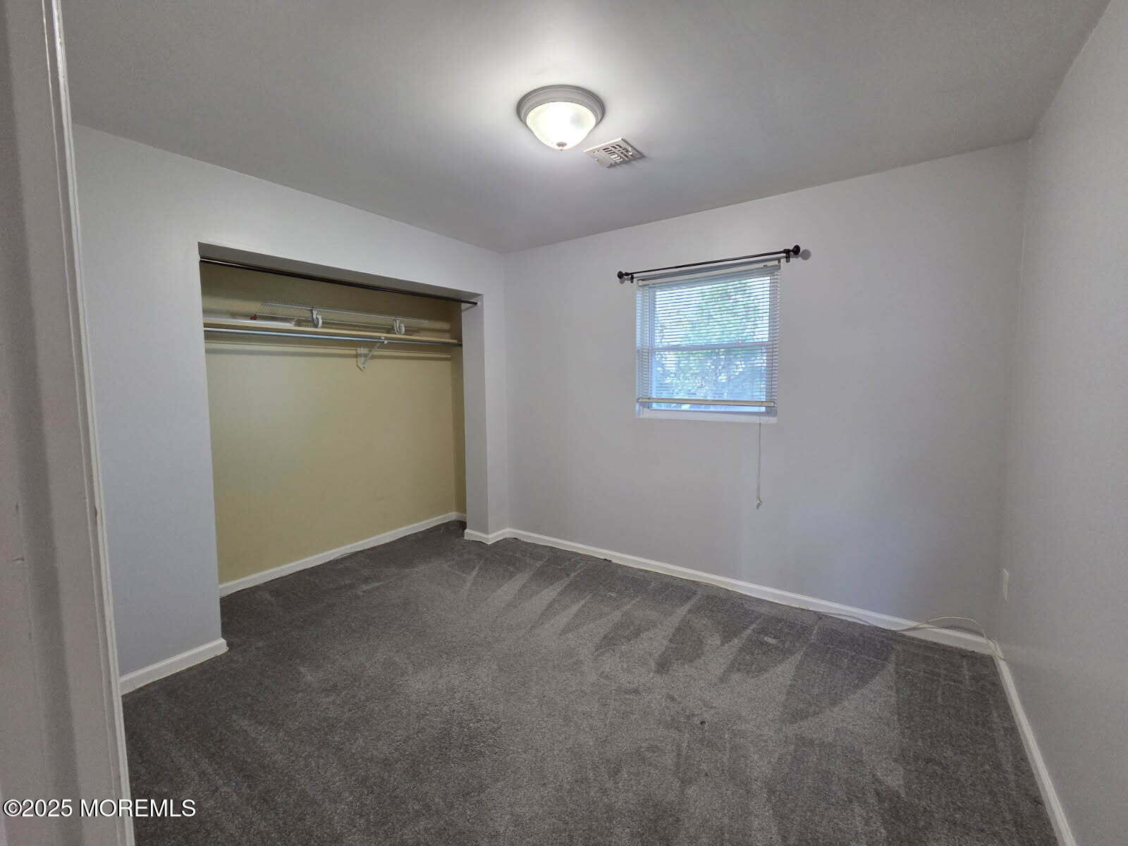 219 Dock Street Union Beach, NJ 07735 - Photo 16 of 22 an empty room with a workbench
