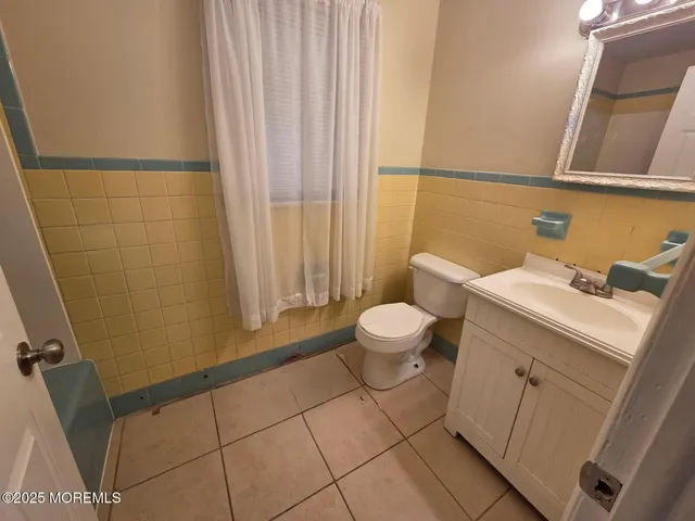 a bathroom with a sink and a vanity