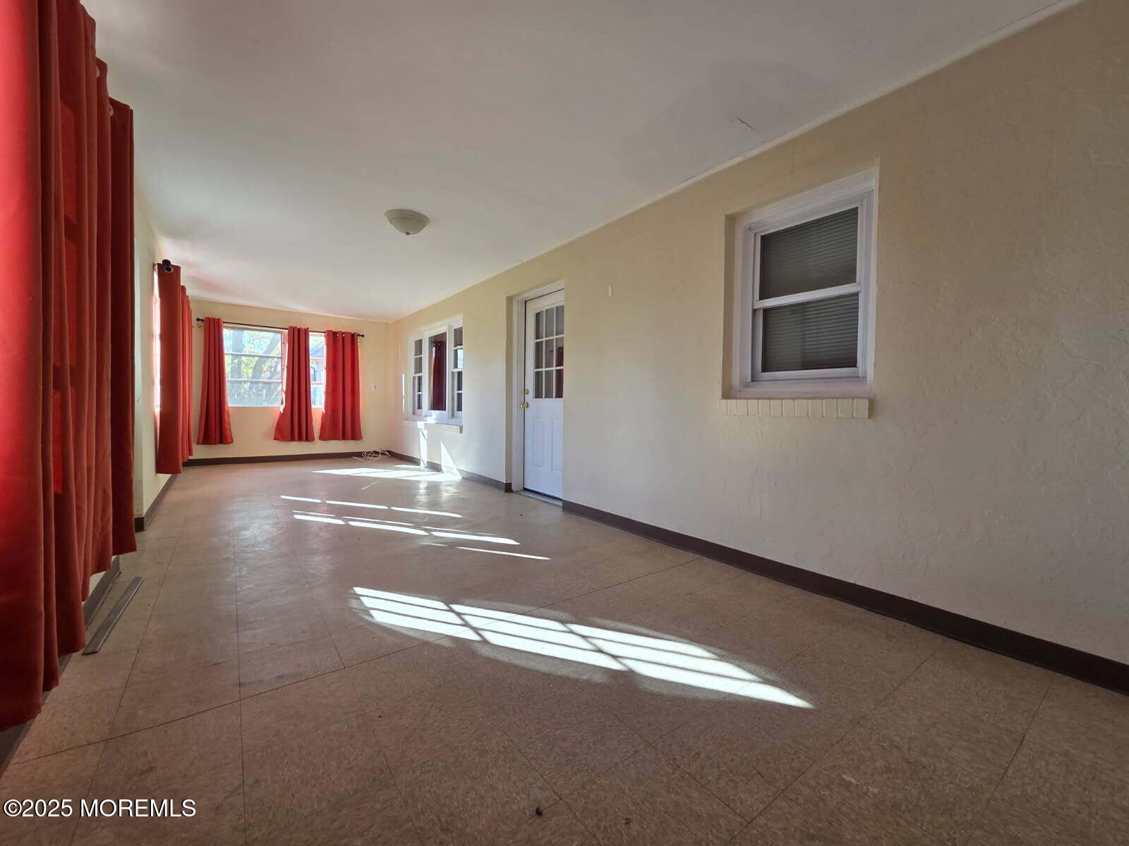 219 Dock Street Union Beach, NJ 07735 - Photo 3 of 22 a view of empty room with window