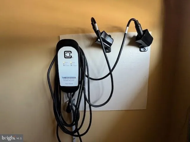 a close view of light fixtures and a mirror of a bathroom