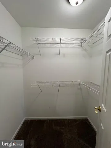 a view of a room with racks on the wall