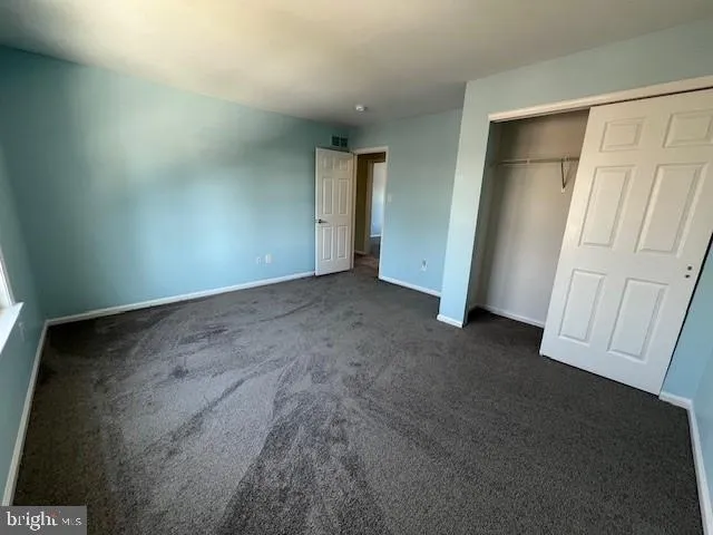 a bathroom with a sink a toilet and a shower
