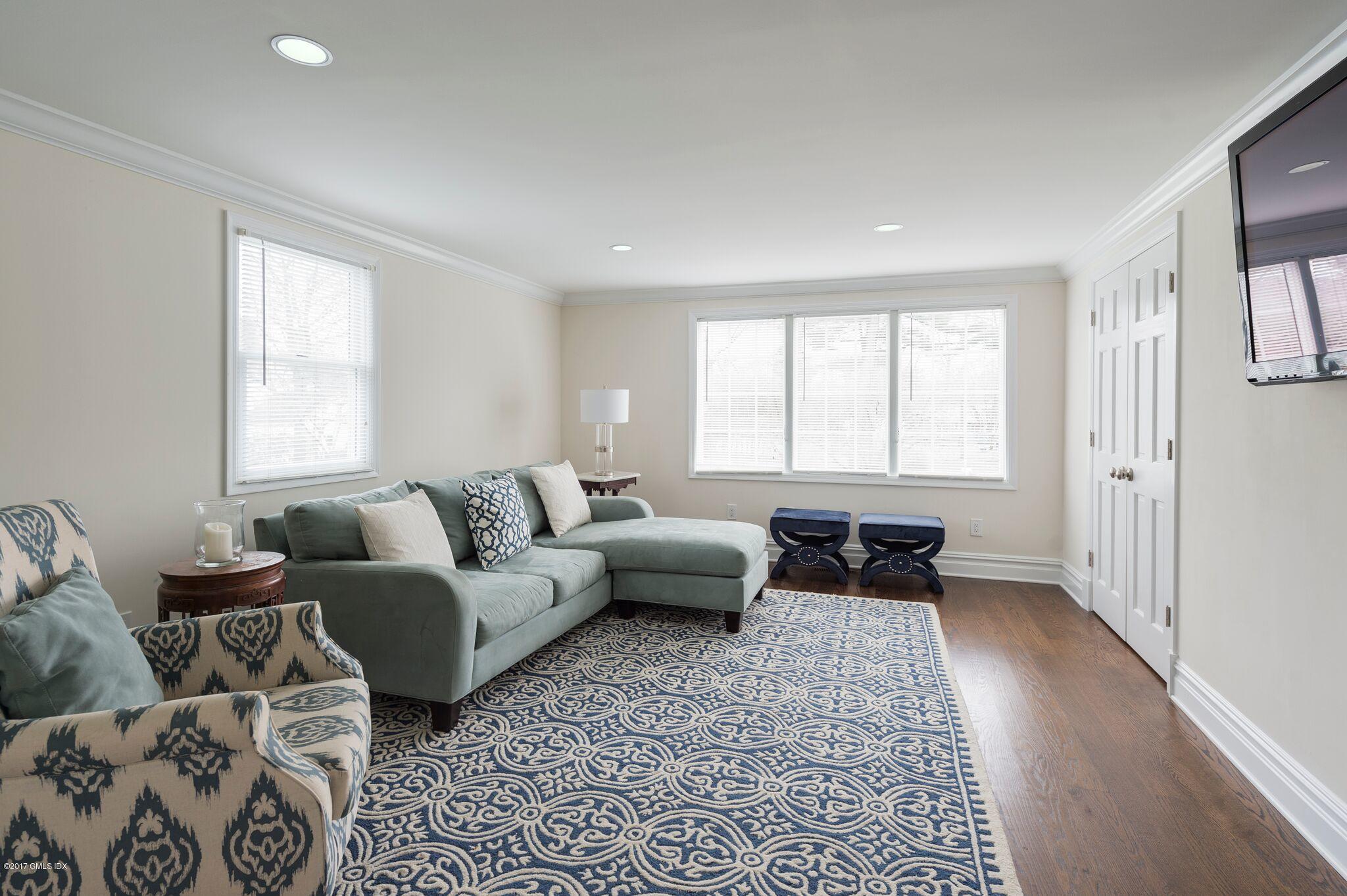 69 Circle Drive Greenwich, CT 06830 - Photo 16 of 21 a living room with furniture and a couch