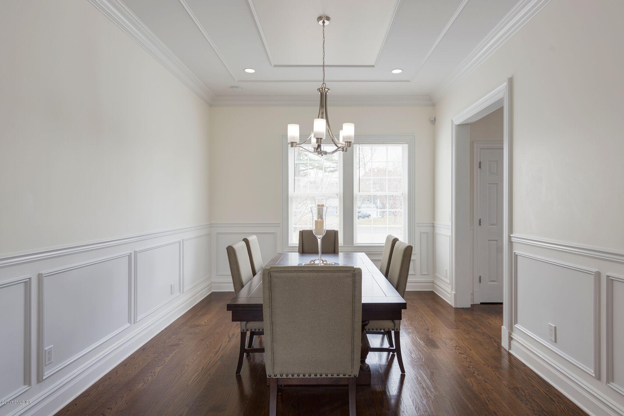 69 Circle Drive Greenwich, CT 06830 - Photo 17 of 21 a view of a dining room with furniture window and wooden floor