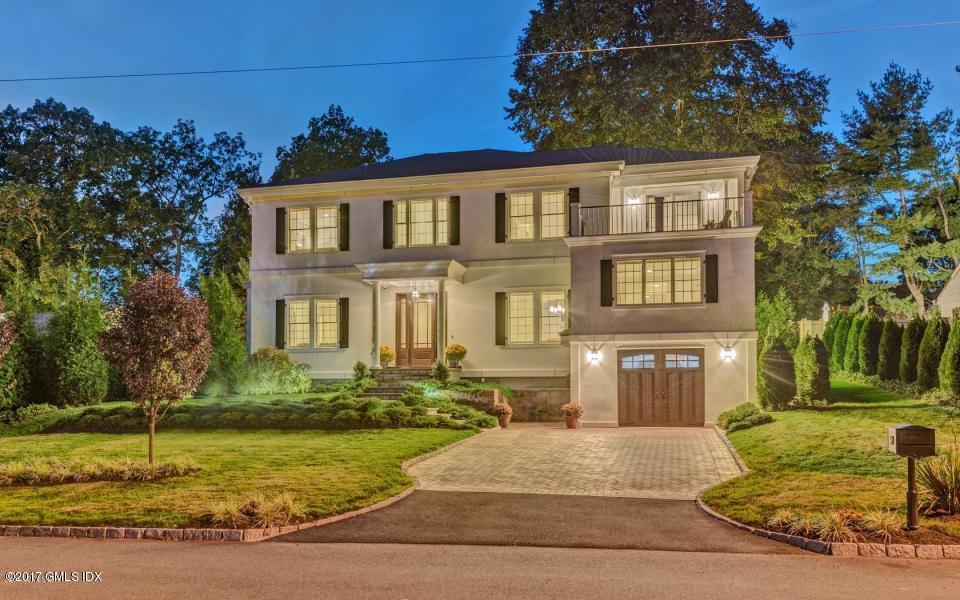 69 Circle Drive Greenwich, CT 06830 - Photo 21 of 21 a front view of a house with garden