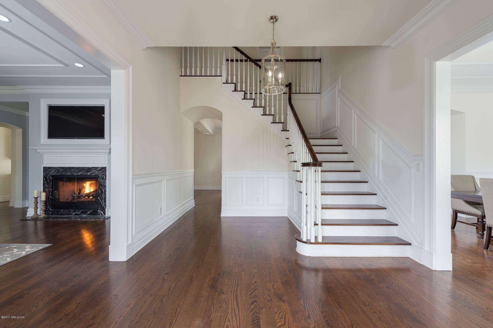 69 Circle Drive Greenwich, CT 06830 - Photo 5 of 21 a view of entryway and hall with wooden floor