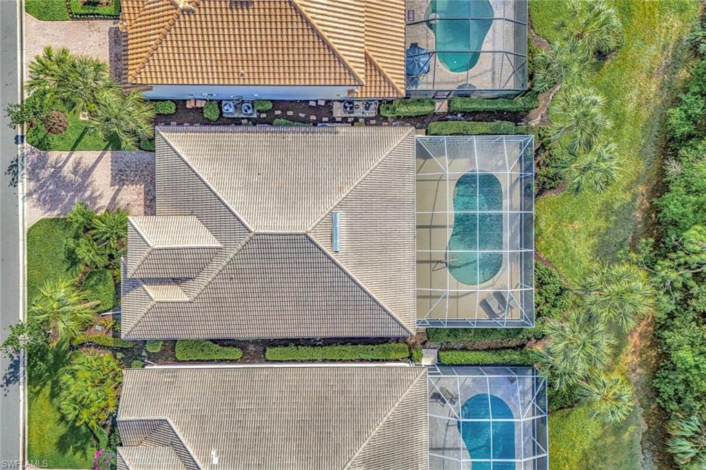 9375 Oak Strand Drive Estero, FL 34135 - Photo 26 of 30 a aerial view of a house with a balcony