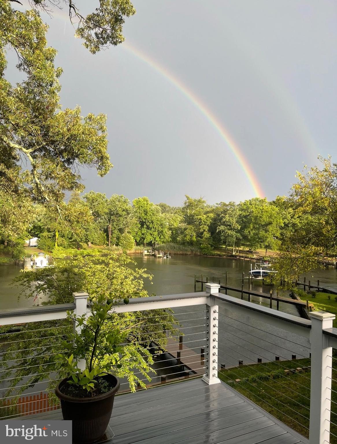 787 Powhatan Beach Road Pasadena, MD 21122 - Photo 11 of 12 a view of a lake from a terrace