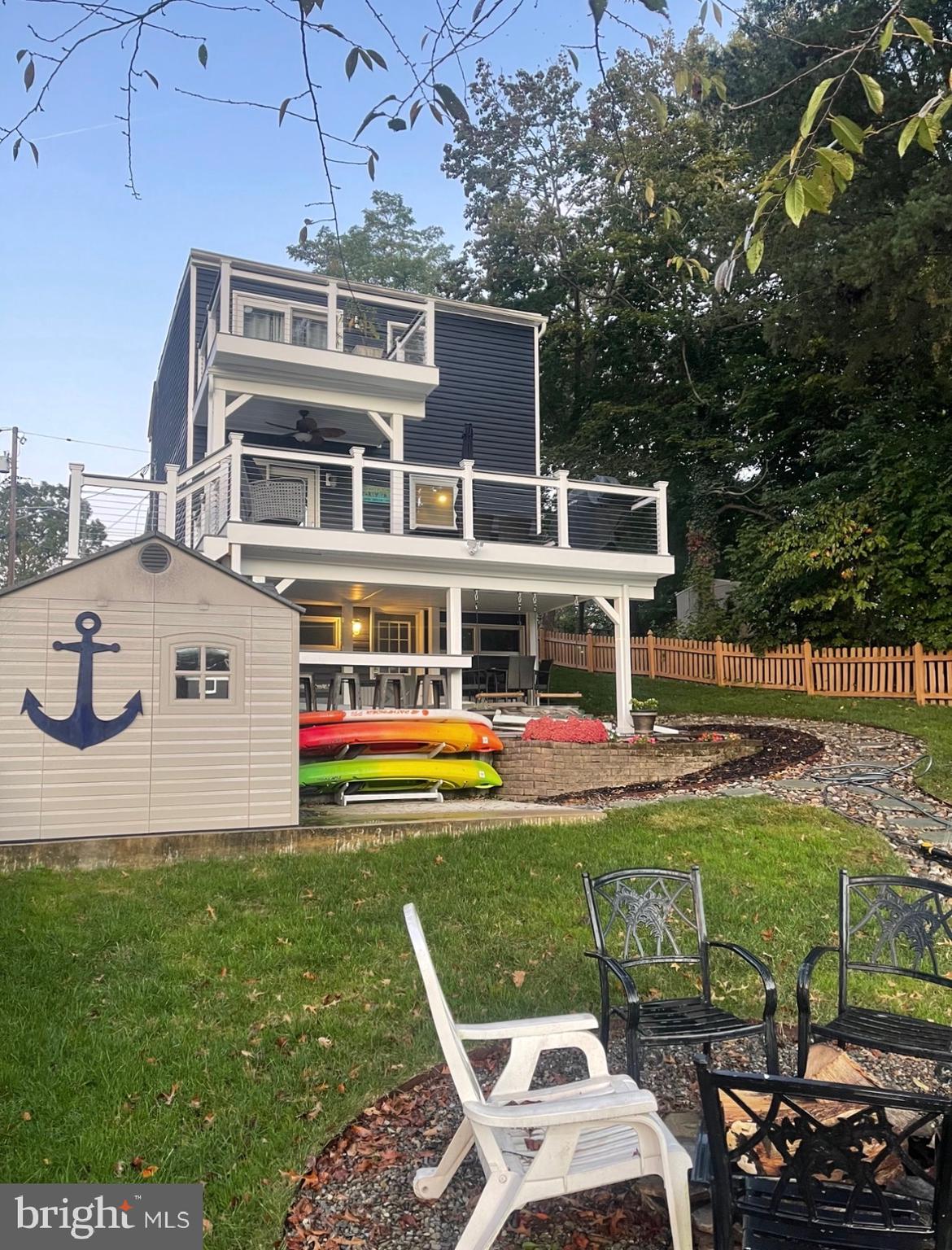 787 Powhatan Beach Road Pasadena, MD 21122 - Photo 3 of 12 a front view of a house with garden