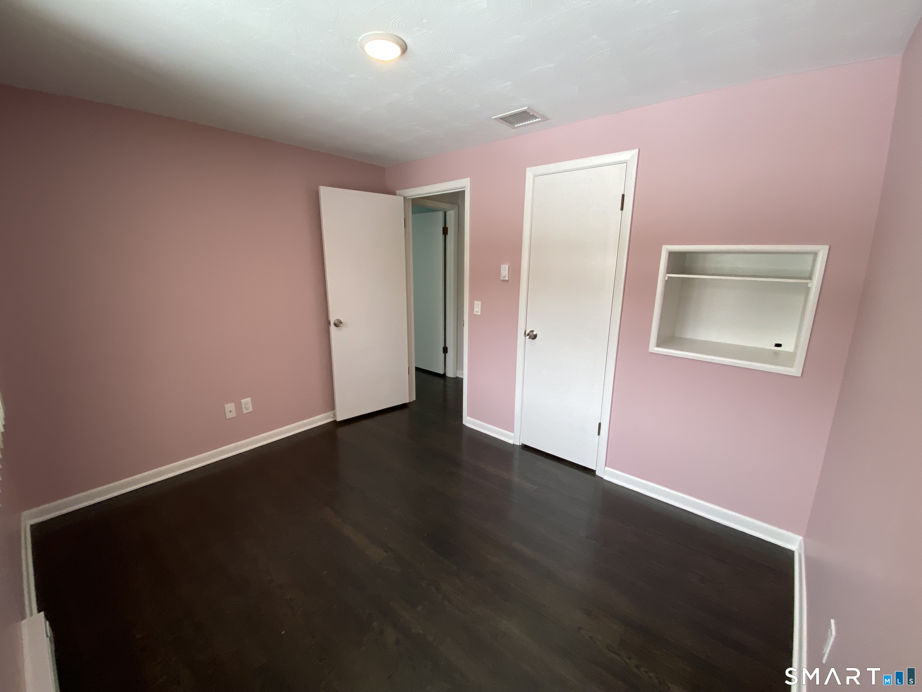 36 Corey Road North Haven, CT 06473 - Photo 17 of 25 a view of an empty room with wooden floor