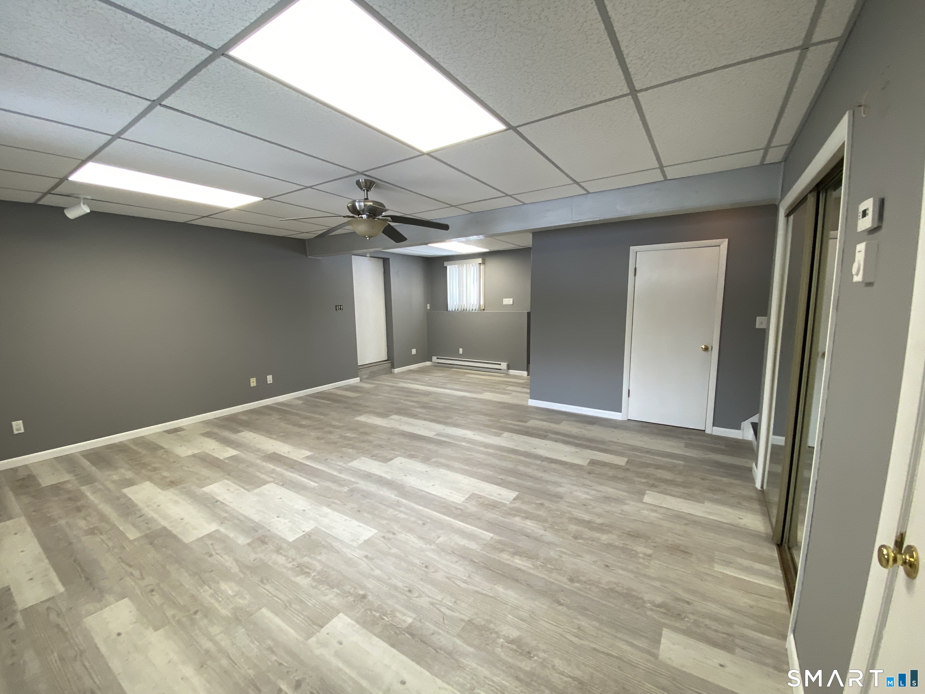 36 Corey Road North Haven, CT 06473 - Photo 18 of 25 a view of a livingroom with a staircase