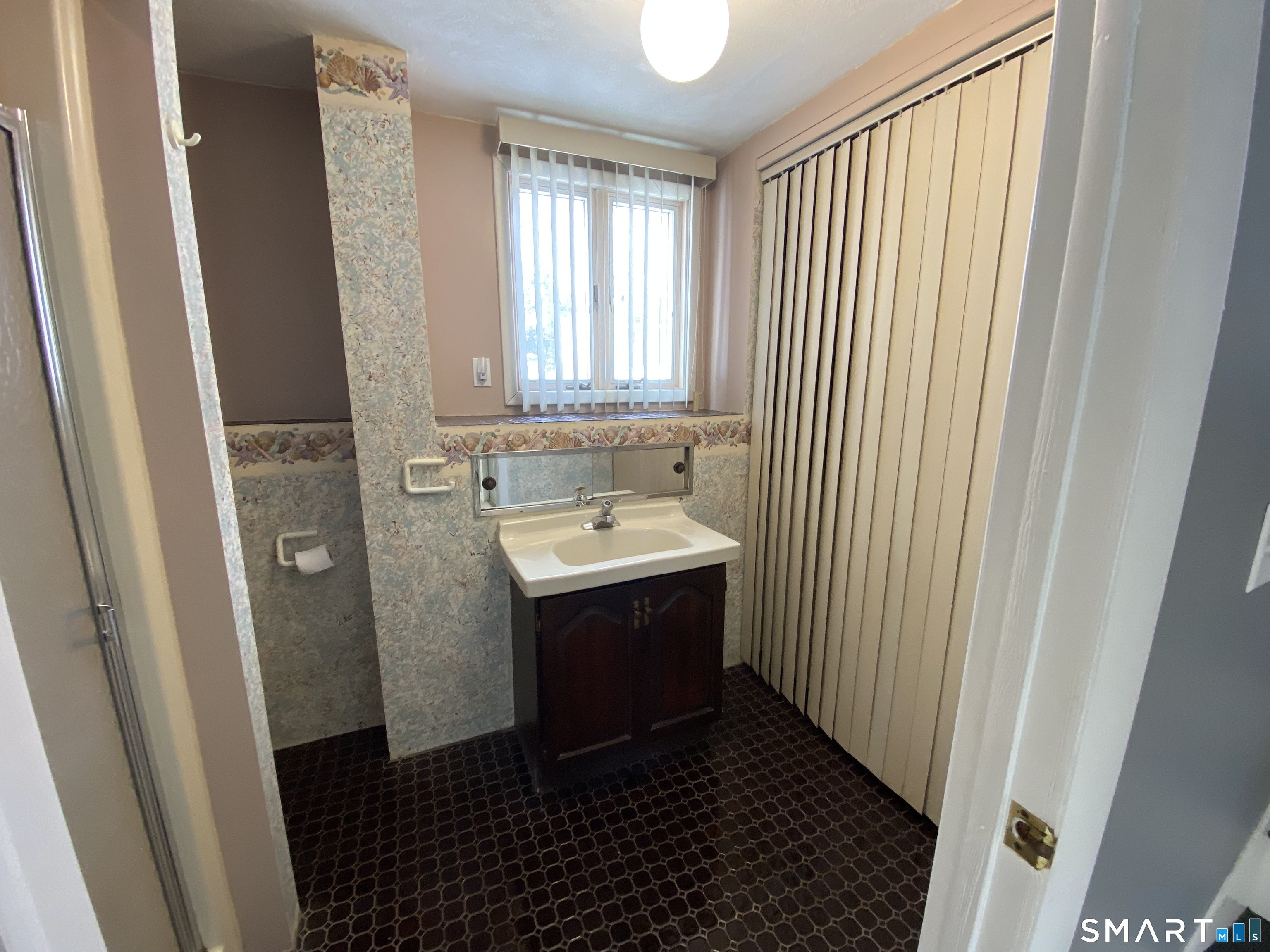 36 Corey Road North Haven, CT 06473 - Photo 20 of 25 a bathroom with a sink and a mirror