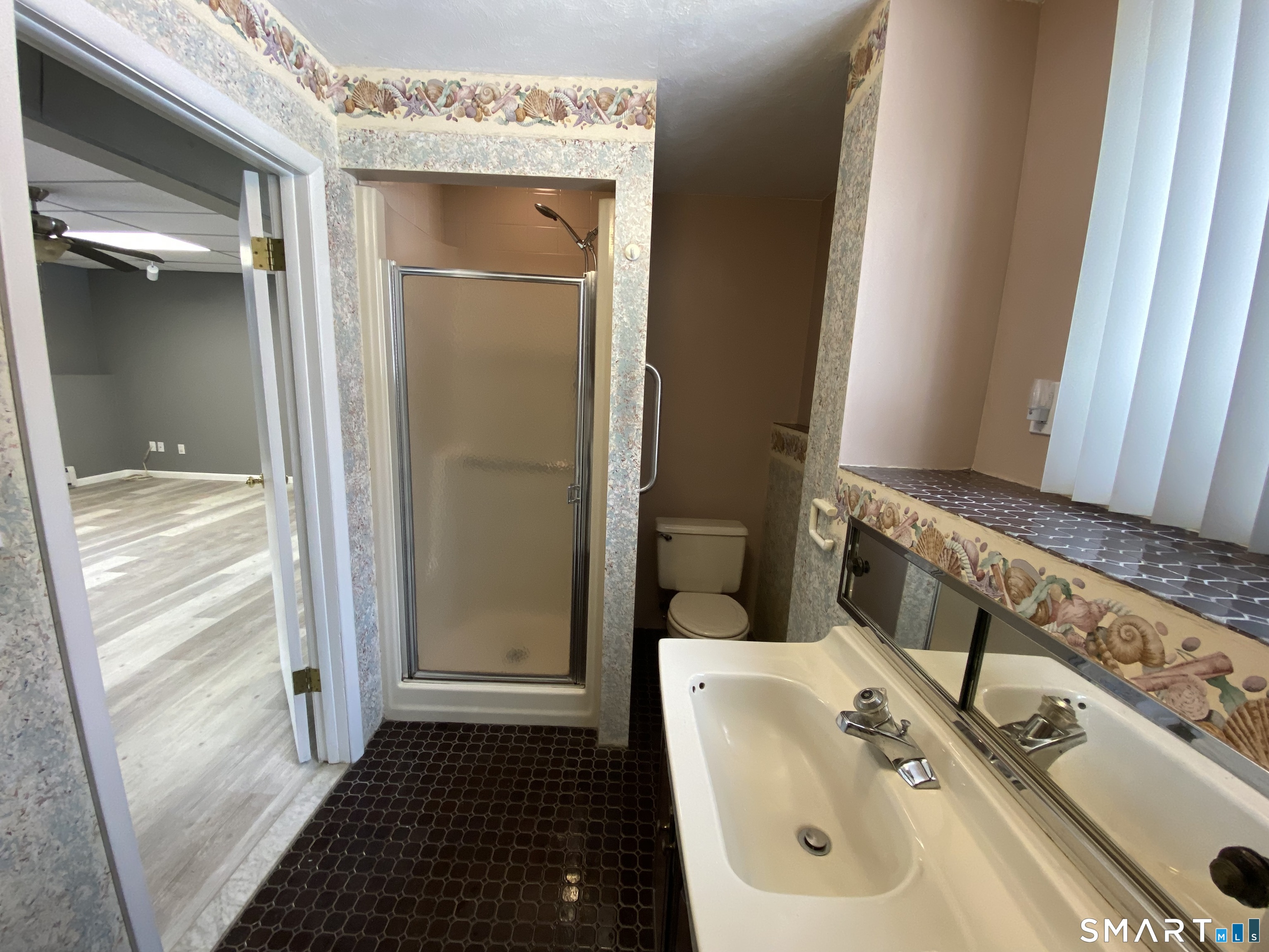 36 Corey Road North Haven, CT 06473 - Photo 21 of 25 a bathroom with a sink and a mirror