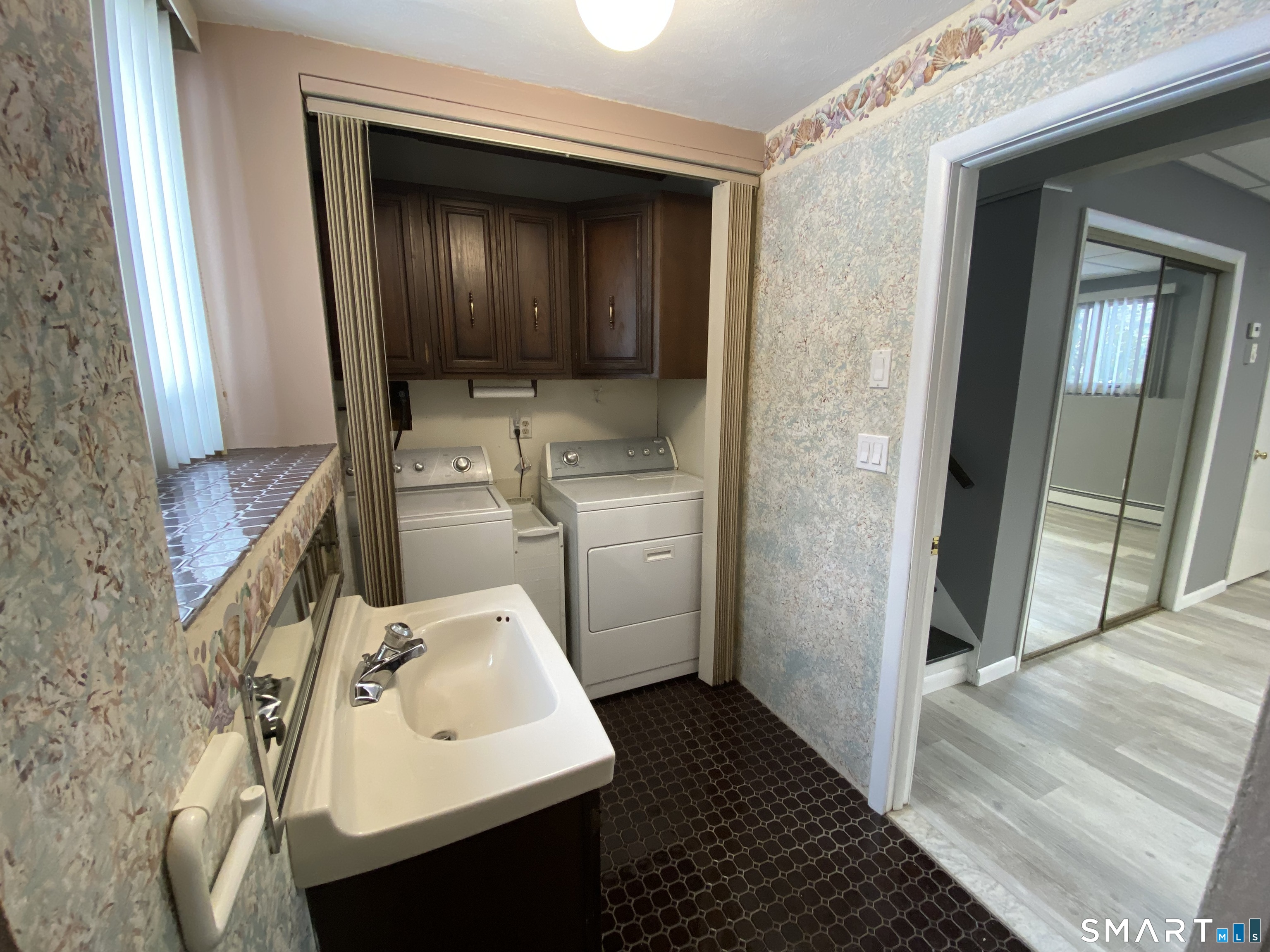 36 Corey Road North Haven, CT 06473 - Photo 22 of 25 a bathroom with a sink and mirror