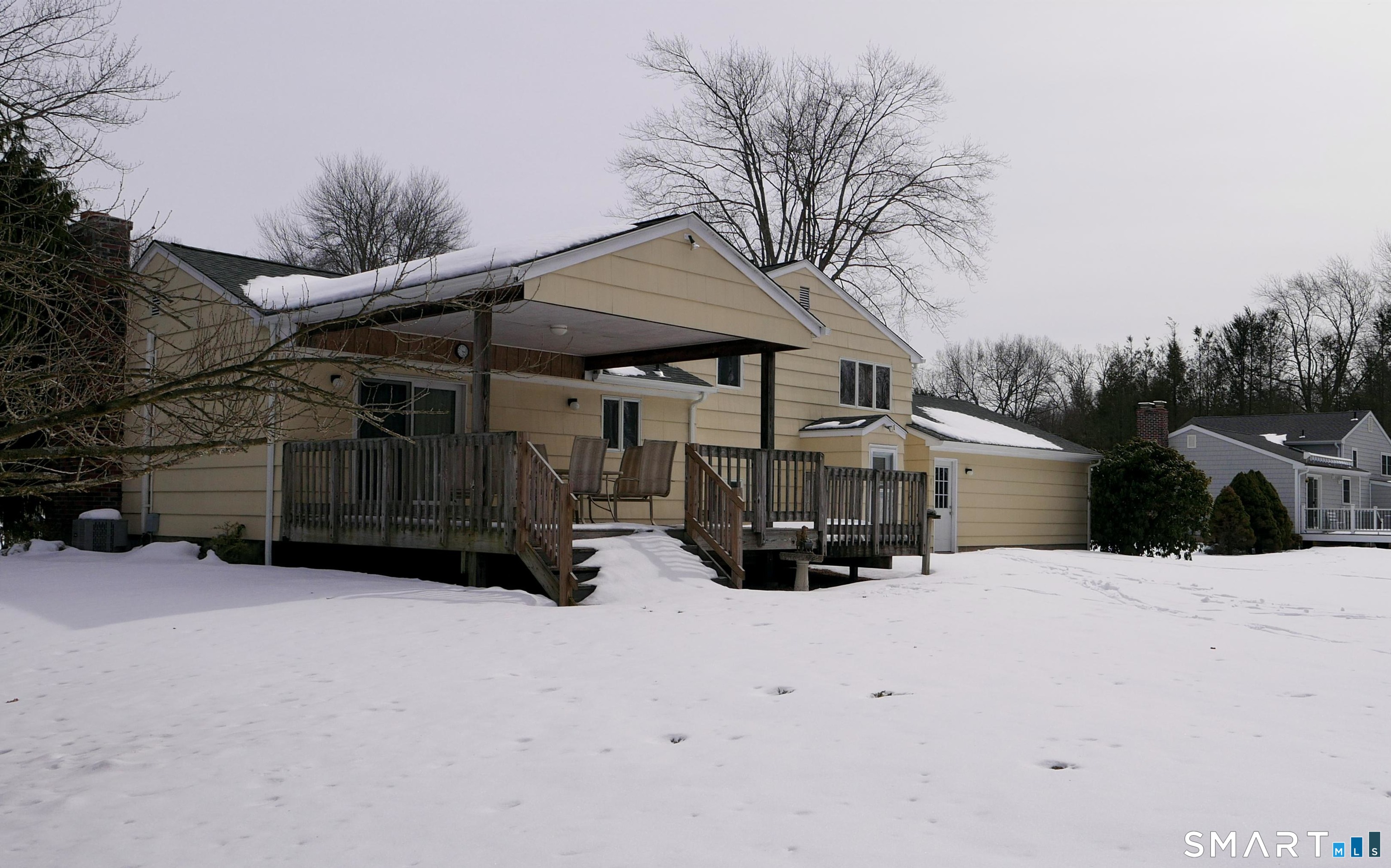36 Corey Road North Haven, CT 06473 - Photo 24 of 25 a view of a house with a snow in the yard