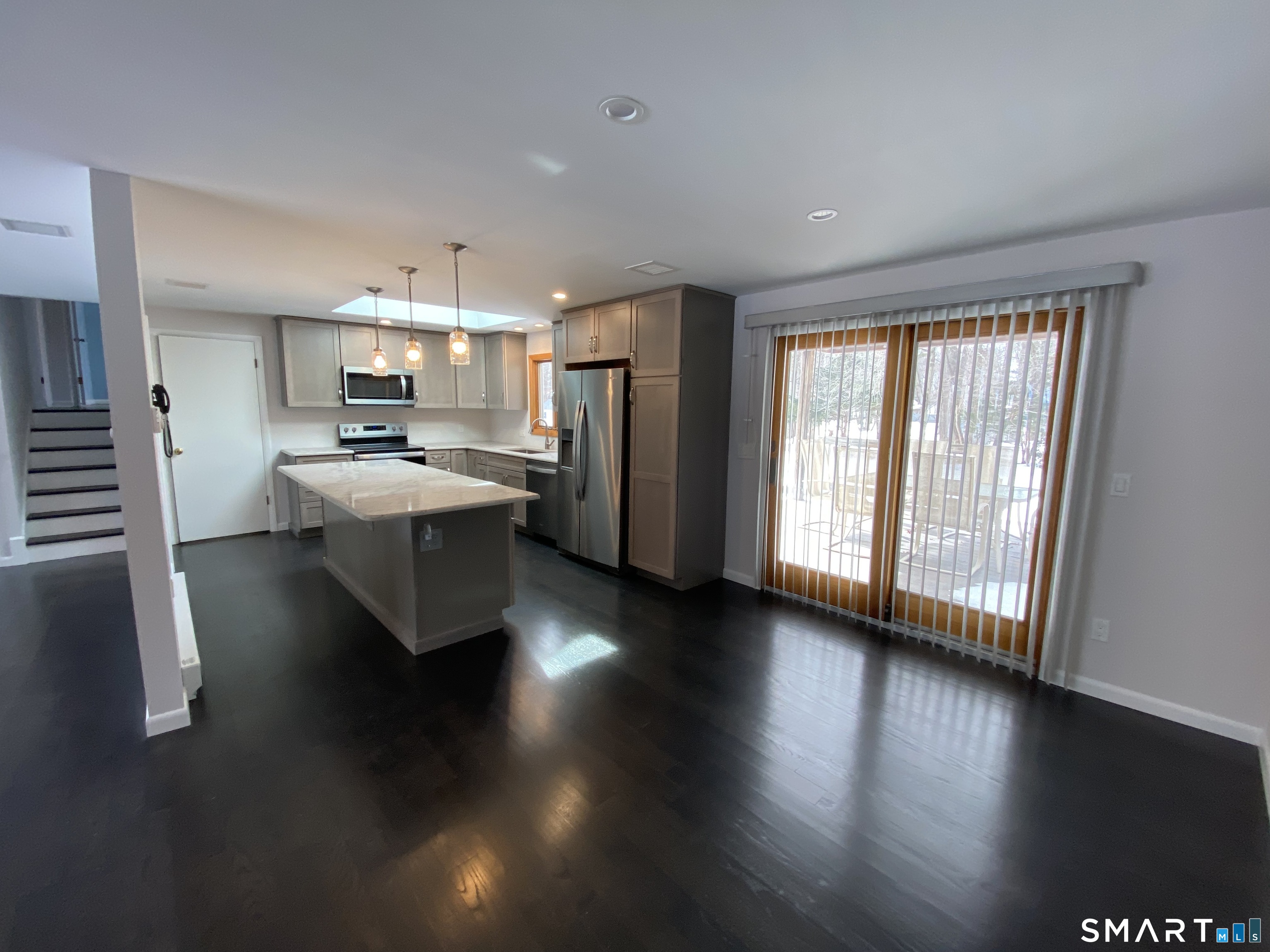 36 Corey Road North Haven, CT 06473 - Photo 6 of 25 a living room with stainless steel appliances wooden floors and kitchen view