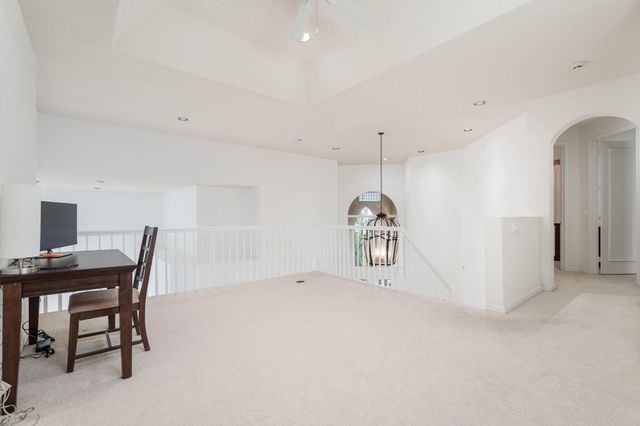 a view of a workspace with furniture