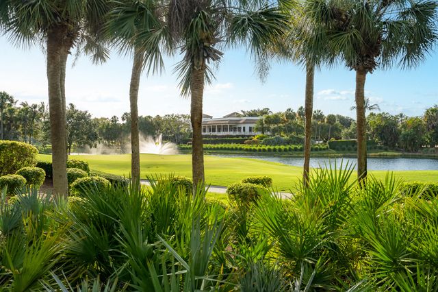 a view of a swimming pool and a yard