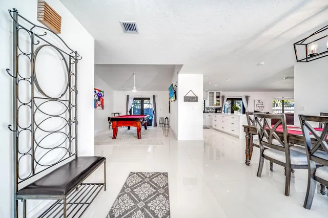 a room with furniture and white walls
