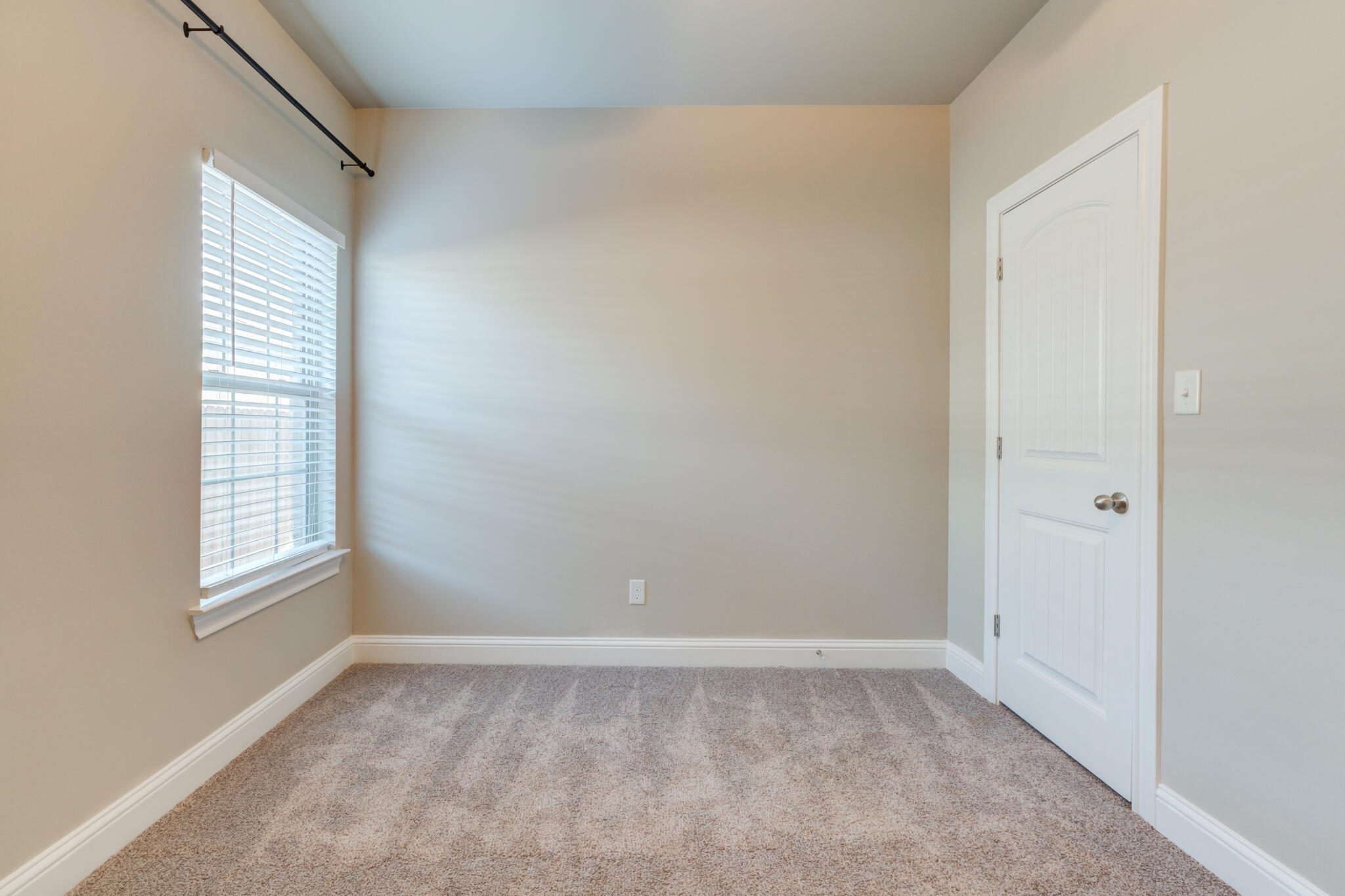 7633 87th Street Lubbock, TX 79424 - Photo 42 of 47 a view of an empty room with a window
