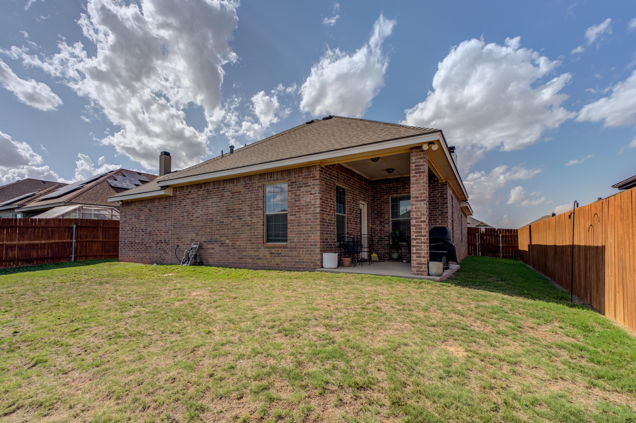 7633 87th Street Lubbock, TX 79424 - Photo 47 of 47 a view of a house with a yard and garage