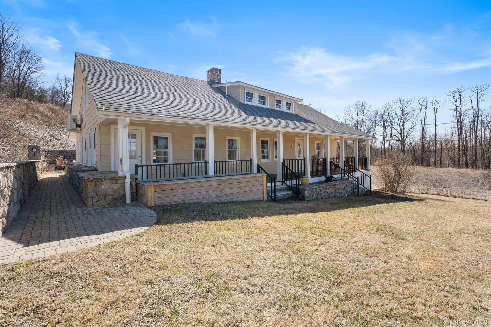 70 Barmore Road LaGrangeville, NY 12540 - Photo 1 of 47 Back of property with a shingled roof, covered porch, a chimney, and a lawn
