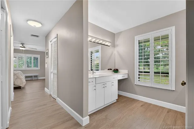 a view of a kitchen with a stove top oven