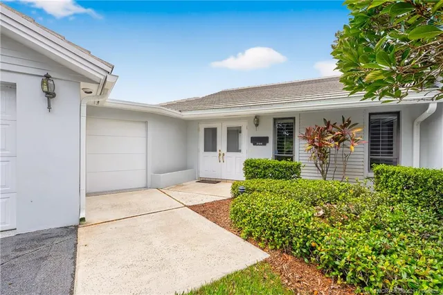 front view of a house with an outdoor space