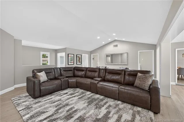 a living room with furniture and a couch