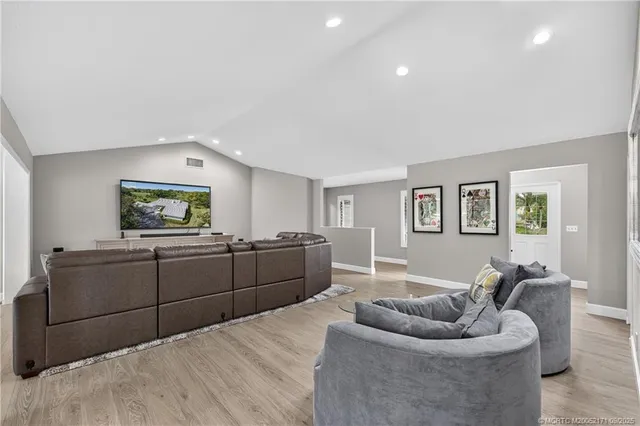 a living room with furniture and a couch