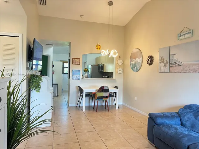 a view of a livingroom with furniture and furniture