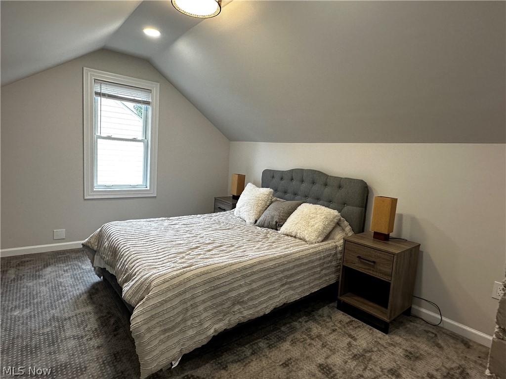 2255 Edgerton Road University Heights, OH 44118 - Photo 31 of 33 Bedroom featuring lofted ceiling and dark carpet