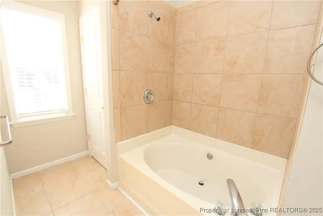 a bathroom with a bathtub