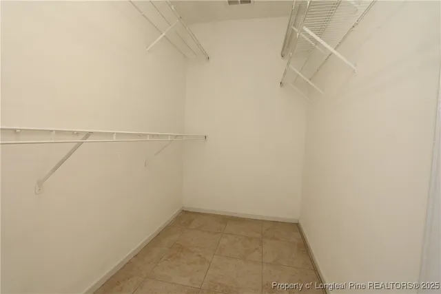 a view of a room with racks on the wall