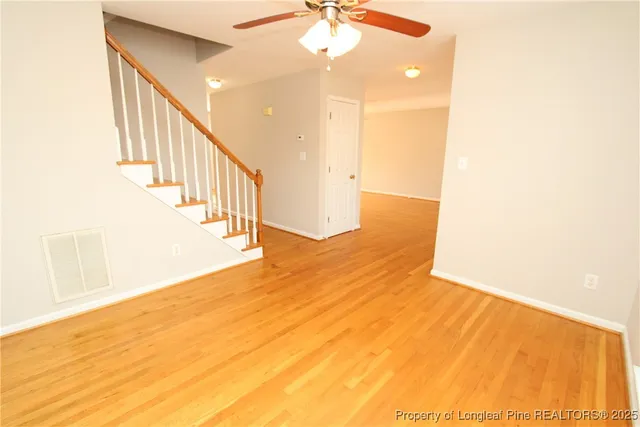 a view of entryway with wooden floor