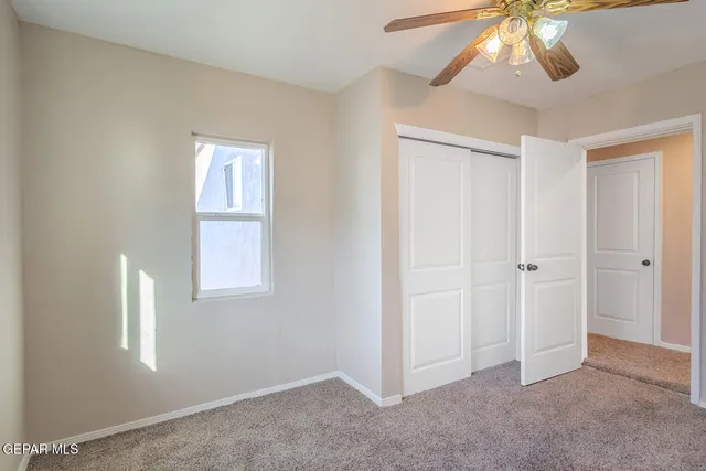 a bathroom with a sink a shower and a mirror