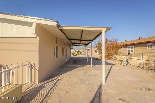 a view of balcony with furniture