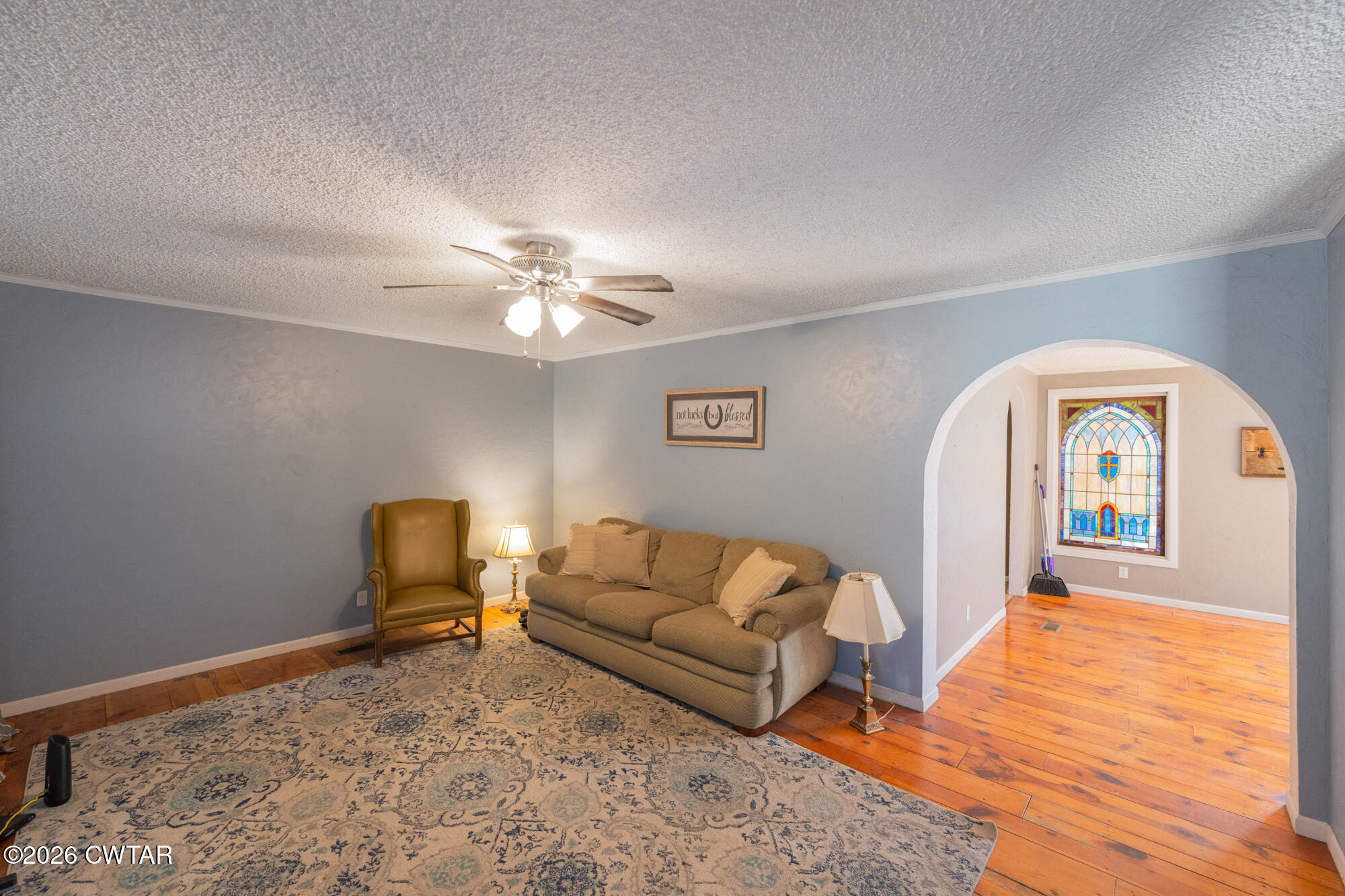 101 Red Ribbon Road Westport, TN 38387 - Photo 24 of 51 a living room with furniture and a wooden floor